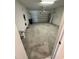 Spacious garage with an automatic door, storage and ample space for vehicles and projects at 11634 Woodleaf Dr, Bradenton, FL 34211