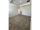 Main bedroom featuring carpet flooring, recessed lighting and access to the ensuite at 11634 Woodleaf Dr, Bradenton, FL 34211