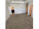 Main bedroom features carpet flooring with doors leading to the ensuite at 11634 Woodleaf Dr, Bradenton, FL 34211