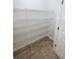 Pantry with multiple shelves for ample storage space and organization at 11634 Woodleaf Dr, Bradenton, FL 34211