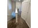 Carpeted staircase with white trim, leading to the upper level and various rooms at 11634 Woodleaf Dr, Bradenton, FL 34211