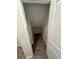 Under stairs storage space featuring tile flooring at 11634 Woodleaf Dr, Bradenton, FL 34211