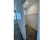 Walk-in closet features carpet flooring, wire shelving and a window at 11634 Woodleaf Dr, Bradenton, FL 34211