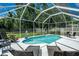 Enjoy the outdoors with a private screened-in pool and patio area, perfect for relaxation and entertaining at 11837 Derbyshire Dr, Tampa, FL 33626