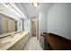 Bathroom featuring dual sinks, vanity area, tile flooring and ample lighting at 1310 Rustlewood Dr, Brandon, FL 33510