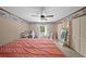 Bright bedroom boasting a window, closet, and desk perfect for work or study at 1310 Rustlewood Dr, Brandon, FL 33510