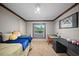 Bedroom featuring a window, a desk, and plenty of space for rest and study at 1310 Rustlewood Dr, Brandon, FL 33510