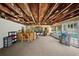 Large rec room with exposed wood ceiling, bar, seating, and access to the pool at 1310 Rustlewood Dr, Brandon, FL 33510