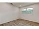 Clean bedroom with two windows allowing for natural light at 13344 88Th Ave, Seminole, FL 33776