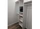 Walk-in closet with custom shelving, providing ample storage and organization options at 13344 88Th Ave, Seminole, FL 33776