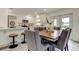 Bright dining area open to the modern kitchen and features a door to the outdoors at 13344 88Th Ave, Seminole, FL 33776