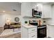 Open floor plan showcasing a seamless flow between the kitchen and living area at 13344 88Th Ave, Seminole, FL 33776