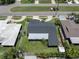 Aerial view of the property showing the backyard, landscaping, and roof at 14060 102Nd Ave, Largo, FL 33774