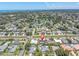 Aerial view of home with neighborhood and partial water view at 14060 102Nd Ave, Largo, FL 33774