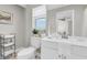 Bright bathroom with vanity, updated fixtures, and decorative accents at 14060 102Nd Ave, Largo, FL 33774