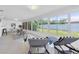 Bright sunroom with tile floors and expansive views of the backyard at 14060 102Nd Ave, Largo, FL 33774
