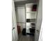 Organized closet features a hanging rod, shelving, and ample storage for all of your organizational needs at 15101 Bald Eagle St, Tampa, FL 33625