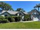 Charming home features manicured landscaping, a well-kept lawn, and a neutral color scheme for pleasing curb appeal at 15101 Bald Eagle St, Tampa, FL 33625