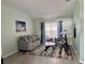 Comfortable living room features a cozy sofa, accent chairs, and stylish decor with great natural light at 15101 Bald Eagle St, Tampa, FL 33625