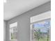 Bright bedroom with a view of an outdoor space at 16972 Oval Rum Dr, Wimauma, FL 33598