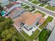 Aerial view of the backyard featuring a patio, manicured lawn, and fenced property at 1712 Azalea Ct # B, Oldsmar, FL 34677