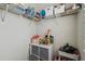 Well-organized closet with shelving and storage furniture, ideal for neatly storing toys and household items at 17880 Althea Blue Pl, Lutz, FL 33558