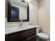 Bathroom featuring a sleek vanity and toilet at 201 Bedford St # 79, Sun City Center, FL 33573