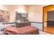 Spa room with massage table, sink, shelving, and decorative wall art, creating a calming ambiance at 201 Bedford St # 79, Sun City Center, FL 33573
