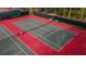 Aerial view of the community's tennis courts, perfect for an active lifestyle at 201 Bedford St # 79, Sun City Center, FL 33573