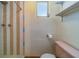 Quaint vintage bathroom featuring shower and toilet at 2123 Indigo Dr, Clearwater, FL 33763
