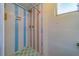Vintage bathroom featuring shower with colorful tiles at 2123 Indigo Dr, Clearwater, FL 33763