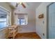 Breakfast nook featuring a small table, wood look tile floor, and bright natural light at 2123 Indigo Dr, Clearwater, FL 33763