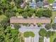 An aerial view of the property, showcasing the building's layout and abundant parking at 2192 Swedish Dr # 26, Clearwater, FL 33763
