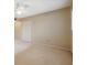 Neutral bedroom with neutral walls, carpet, ceiling fan and a large closet at 2192 Swedish Dr # 26, Clearwater, FL 33763