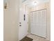 Entryway with tile floors, front door, and closet with bi-fold doors at 2192 Swedish Dr # 26, Clearwater, FL 33763