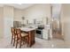 Kitchen with stainless steel oven, appliances and central island at 2192 Swedish Dr # 26, Clearwater, FL 33763