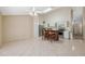 Eat-in kitchen featuring tile floors, stainless steel appliances, and central island at 2192 Swedish Dr # 26, Clearwater, FL 33763