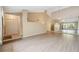 Spacious living room with vaulted ceilings and mirrored wall at 2192 Swedish Dr # 26, Clearwater, FL 33763