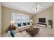 Comfortable living room with bay window, ceiling fan and neutral colors for a calming atmosphere at 2192 Swedish Dr # 26, Clearwater, FL 33763