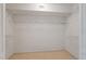 Large walk-in closet with wire shelving, offering optimal storage and organization at 2192 Swedish Dr # 26, Clearwater, FL 33763