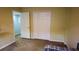 Bedroom features carpet flooring, a closet, and neutral walls at 25435 Bruford Blvd, Land O Lakes, FL 34639