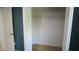 A bedroom closet complete with a shelf for storage at 25435 Bruford Blvd, Land O Lakes, FL 34639