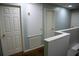 Hallway upstairs with carpet and multiple doors at 25435 Bruford Blvd, Land O Lakes, FL 34639