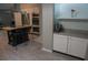 This is a kitchen with an island, wooden countertop, and stainless steel appliances at 25435 Bruford Blvd, Land O Lakes, FL 34639