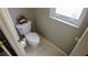 A modern toilet located near a bright window at 25435 Bruford Blvd, Land O Lakes, FL 34639