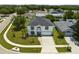 Aerial view of home showing curb appeal and the meticulously maintained lawn at 2746 Heathgate Way, Land O Lakes, FL 34638