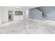Spacious room with elegant floors, offering a versatile layout at 2746 Heathgate Way, Land O Lakes, FL 34638