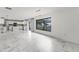 Bright, spacious living room boasts large windows and open floor plan at 2746 Heathgate Way, Land O Lakes, FL 34638