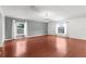 Comfortable bedroom with ample natural light and a decorative chandelier at 2746 Heathgate Way, Land O Lakes, FL 34638