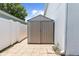 Outdoor shed on a concrete foundation provides extra storage space at 2746 Heathgate Way, Land O Lakes, FL 34638